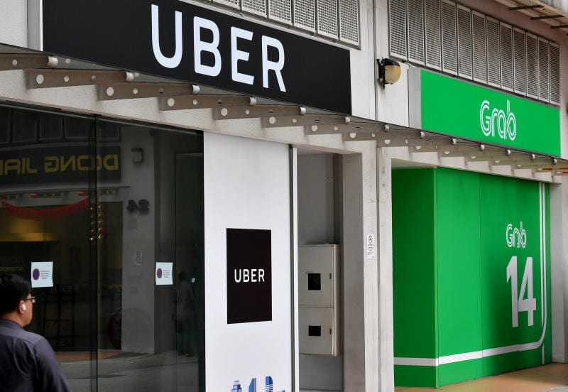 KPPU Singapura Denda Uber dan Grab Rp 141 Miliar