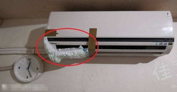 Kreatif! Wanita Ini Tambal AC Bocor Pakai Popok Bayi