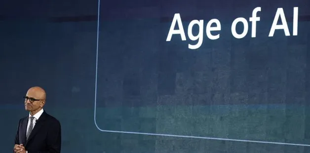 Logo Microsoft dengan latar belakang grafis AI dan game controller