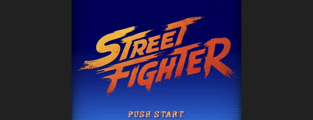 Layar judul Street Fighter dengan teks PUSH START di latar belakang biru