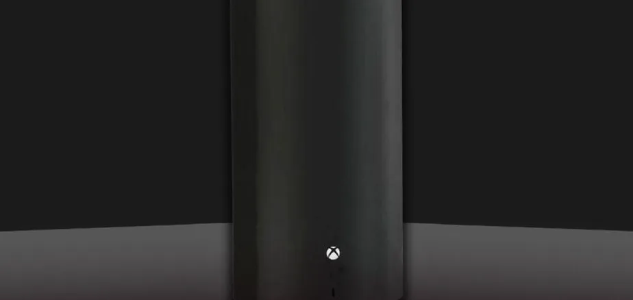 Konsol Xbox Series X hitam dengan desain modern dan lampu LED biru khas Microsoft