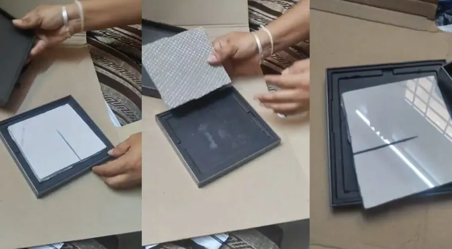 Ilustrasi kotak smartphone Samsung Galaxy Z Fold 7 yang terbuka menunjukkan ubin lantai bukan ponsel