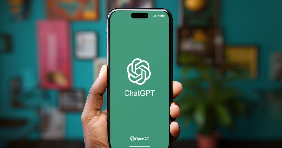 Ilustrasi logo ChatGPT di layar ponsel dengan latar belakang futuristik