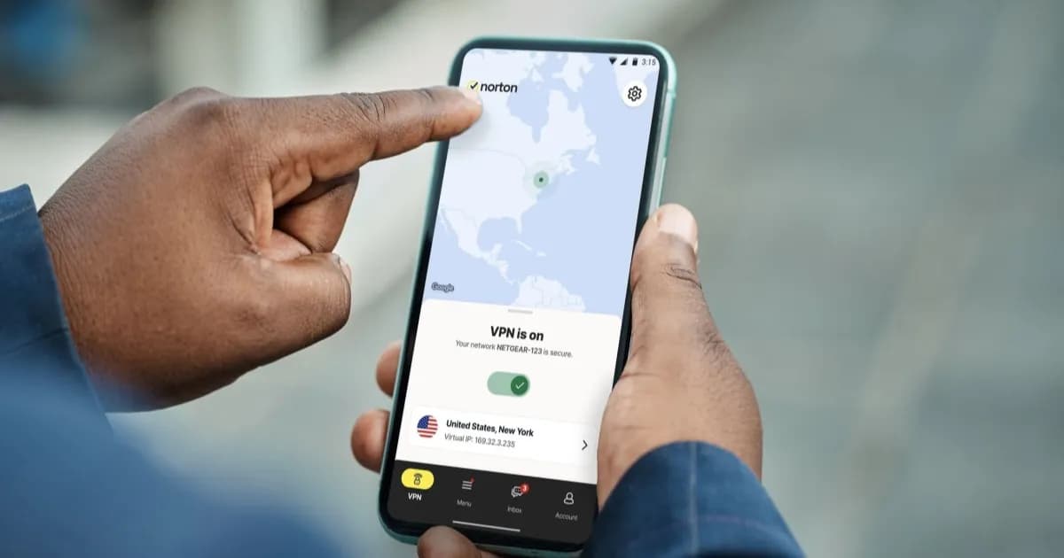 Man holding a phone with the Norton VPN app - promo image