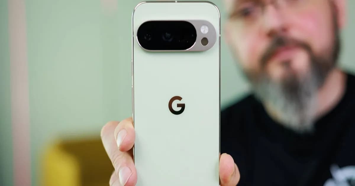 Hand holding the back of a Google Pixel 10 Pro phone.
