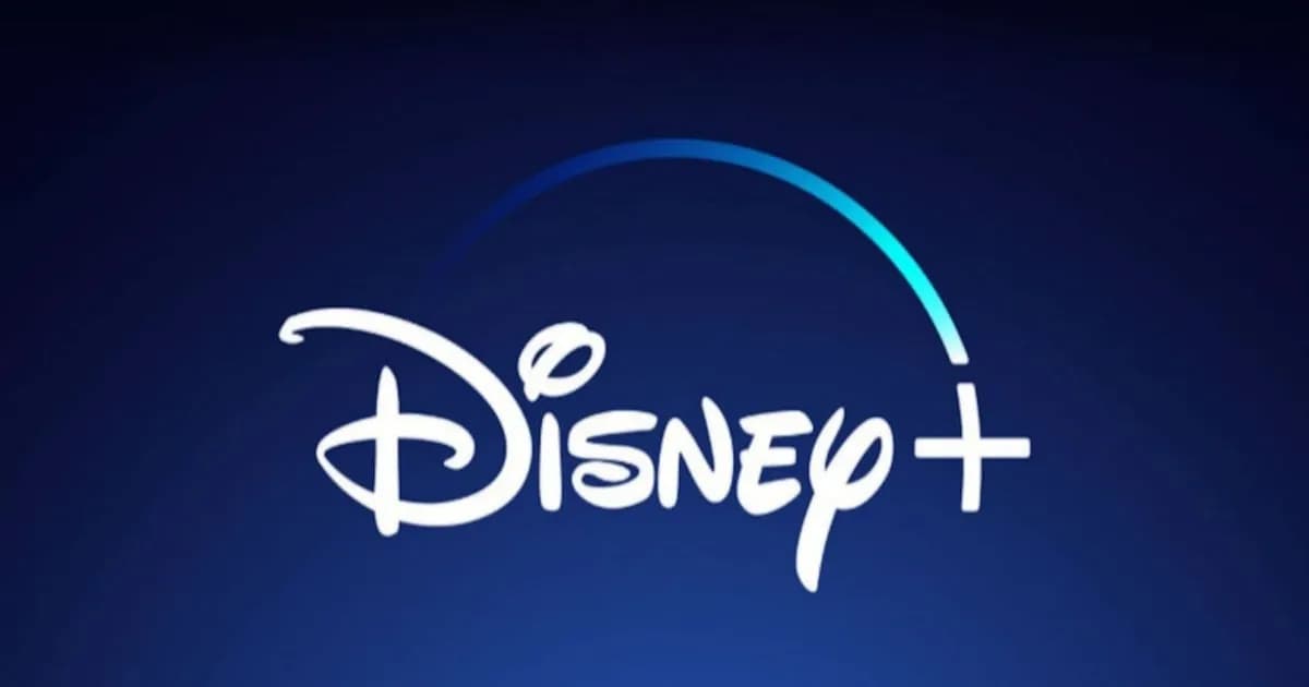 Ilustrasi logo Disney+ dengan latar belakang biru yang mewakili layanan streaming Disney.