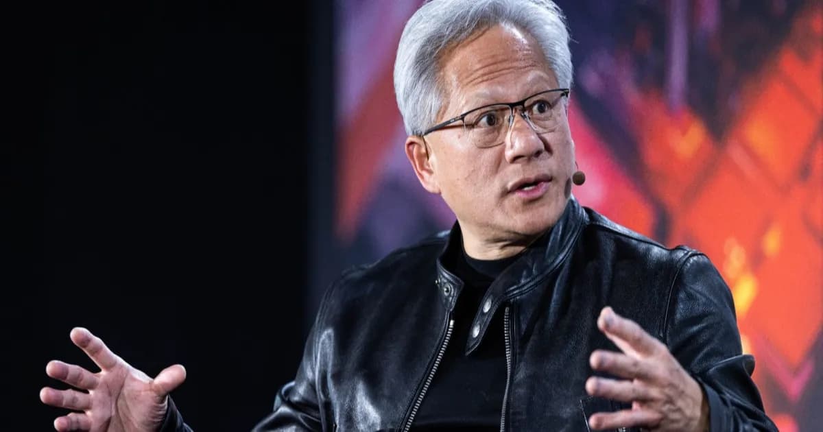 CEO Nvidia Jensen Huang tersenyum dalam wawancara tentang AI