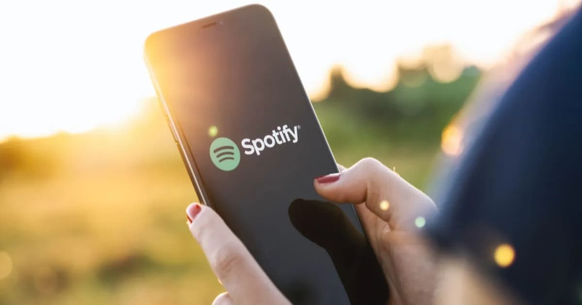 Ilustrasi logo Spotify dengan latar belakang gelap