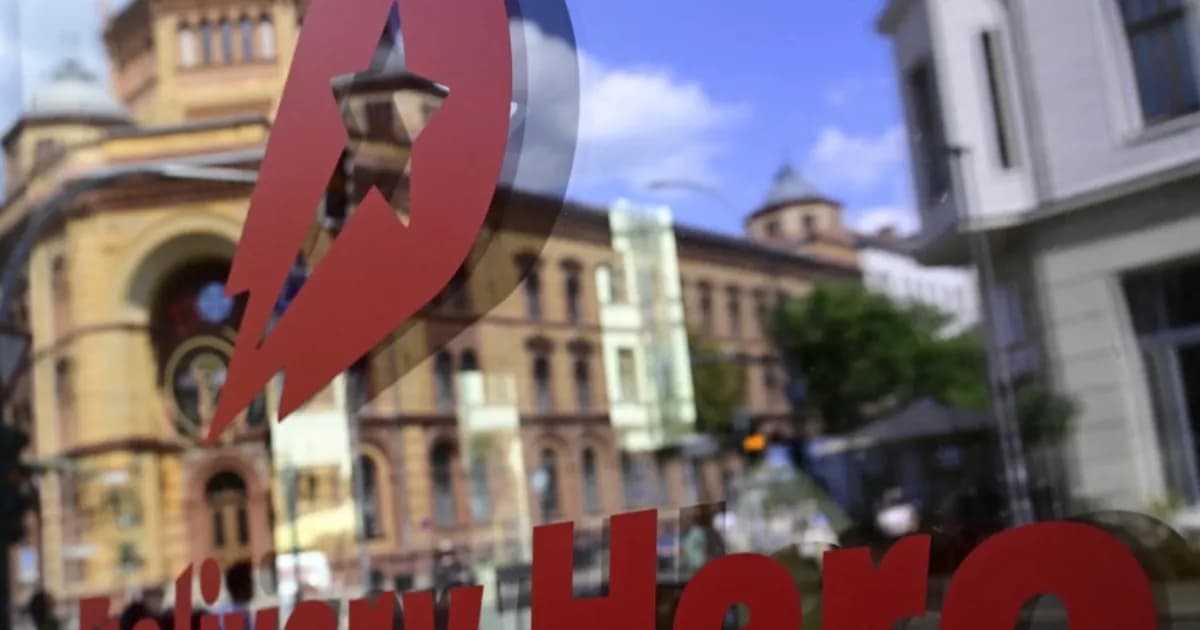 Logo Uber dan Delivery Hero dalam kesepakatan akuisisi senilai 15 miliar dolar AS