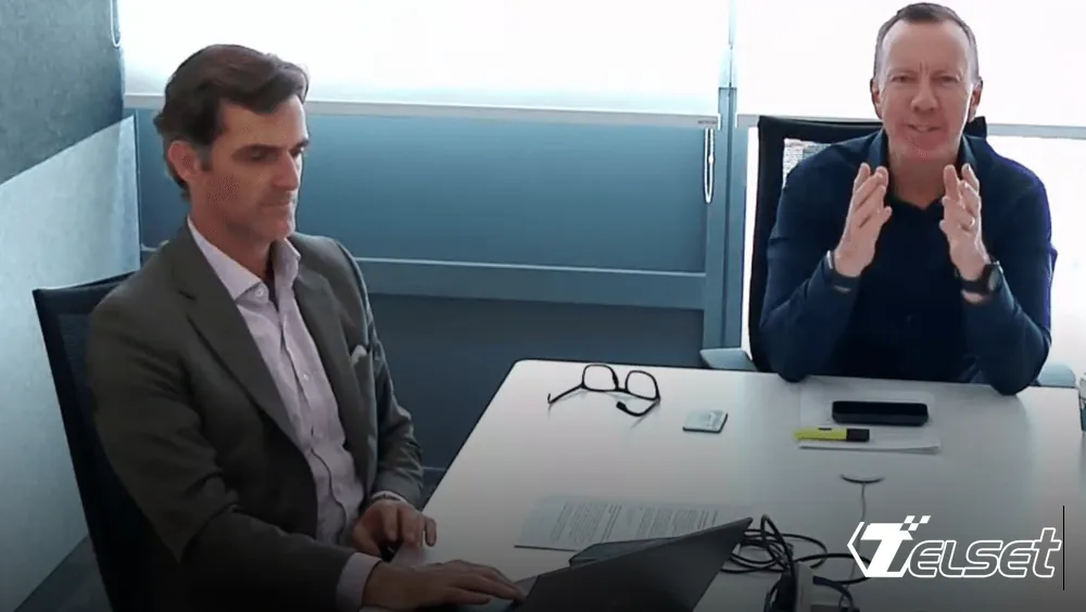 Ilustrasi pabrik cerdas dengan robot dan AI di lini produksi manufaktur modern