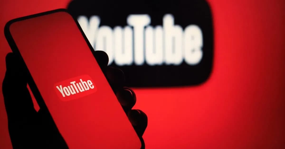 YouTube logo is shown on a telephone with a red background against another black youtube logo, also against a red background