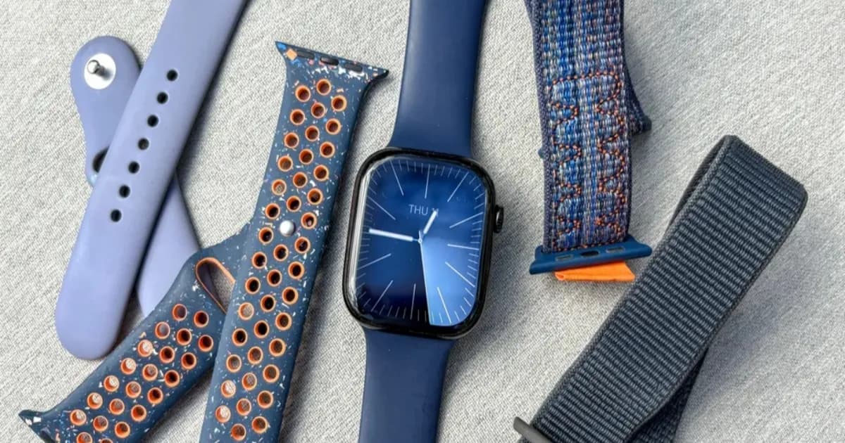 Ilustrasi Apple Watch dengan koleksi bands berwarna-warni yang menunjukkan sistem koneksi strap
