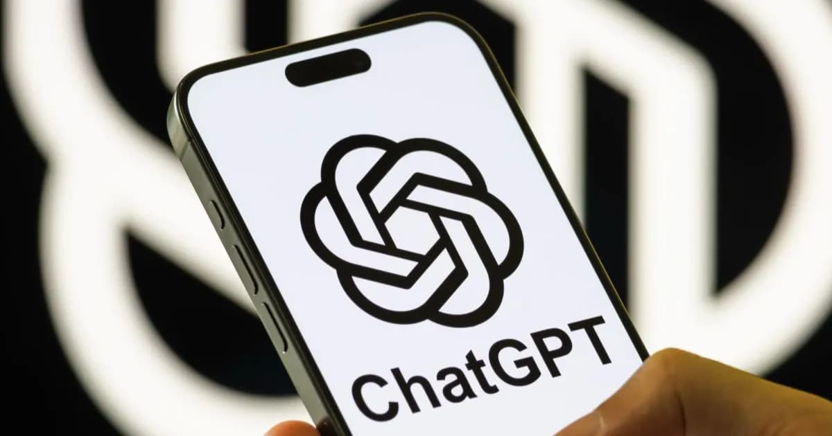 ChatGPT logo on iPhone in person's hand