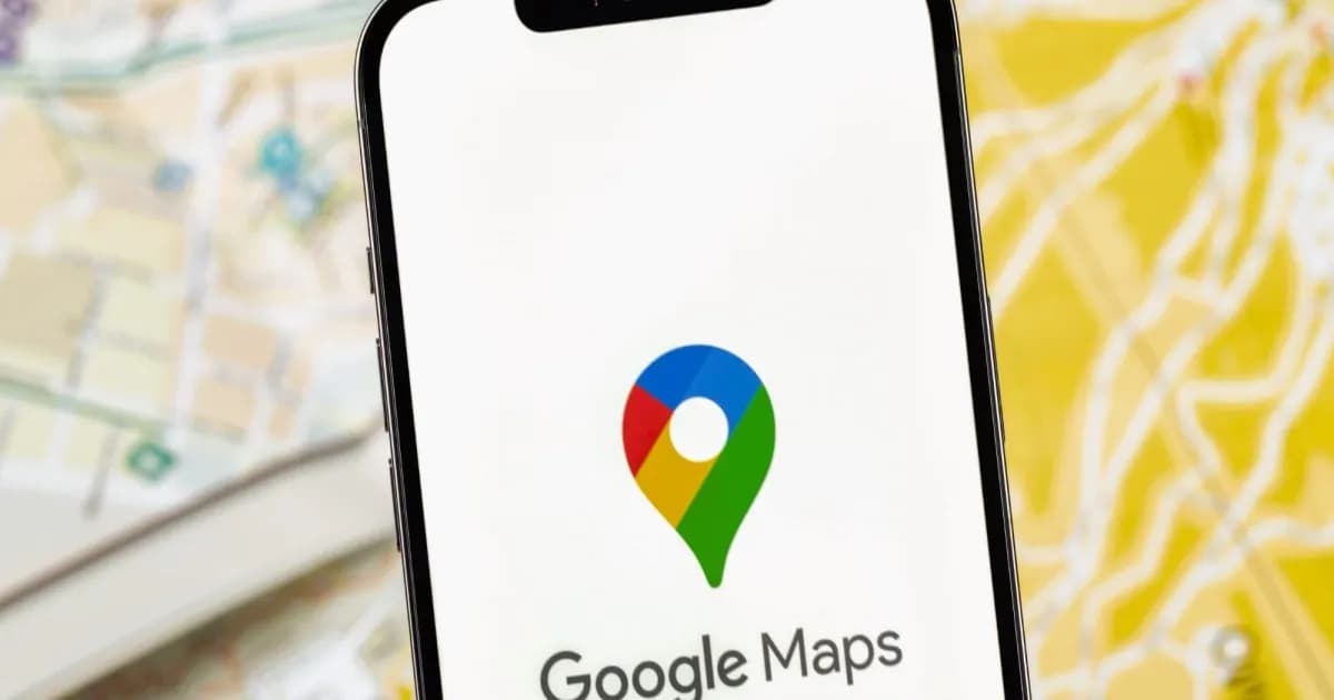 Google Maps logo on phone with map in background