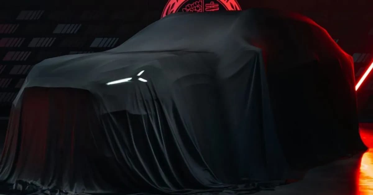 Teaser SUV listrik Mercedes AMG tertutup kain dengan caption Born in Affalterbach