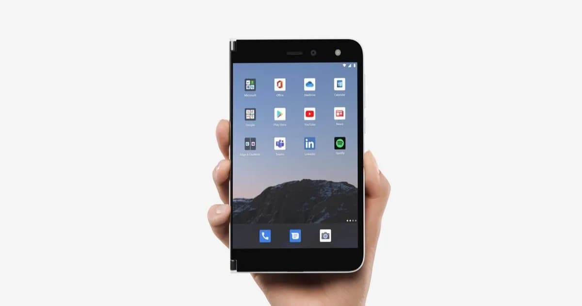 Prototipe Surface Phone Microsoft dengan bingkai logam perak dan logo Microsoft di bagian belakang