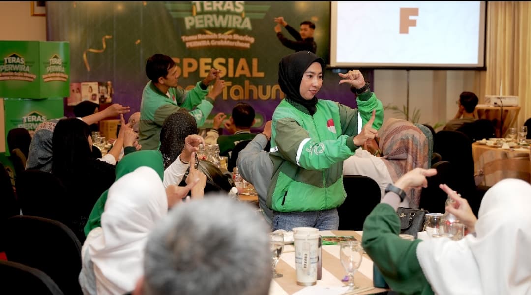 Grab Edukasi Bahasa Isyarat 650 Mitra di 6 Kota, Bagikan 1.000 Rompi