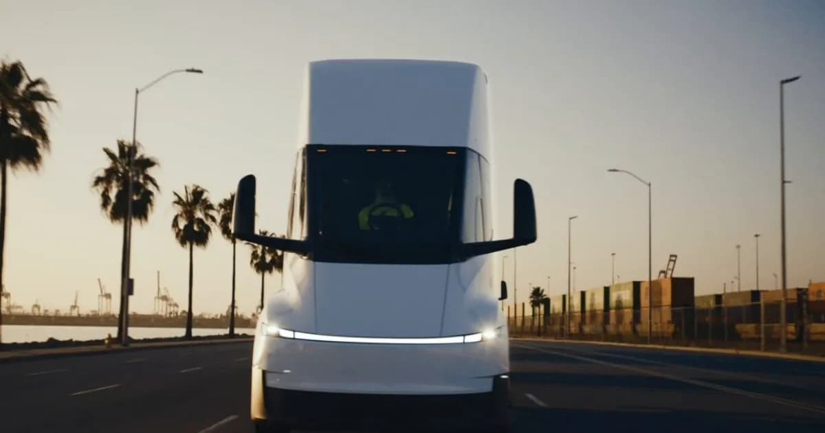 Tesla Semi electric truck driving at dusk