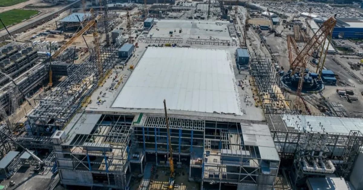 Aerial view of cranes and steel-frame buildings under construction at Intelās Kiryat Gat site in Israel