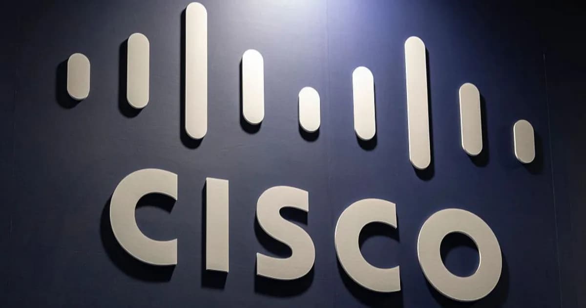 Logo Cisco pada dinding biru sebagai ilustrasi proyek refactor kode legacy dengan AI