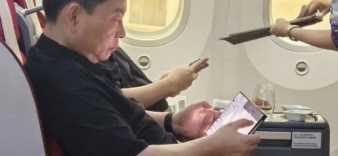 Huawei Chairman Richard Yu spotted using a tri-folding device