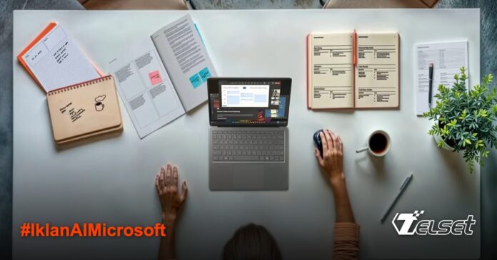 Seseorang bekerja di meja rapi dengan laptop Surface dan perlengkapan kantor lainnya