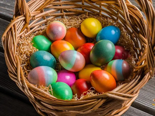 A photo of rainbow easter eggs in a basket captured by Project Indigo.