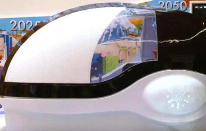 Kapsul Mesin Cuci Manusia buatan Science Co. yang menyerupai gabungan bak mandi dan mesin cuci mobil otomatis.