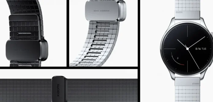 Xiaomi Watch 5 smartwatch dengan layar AMOLED bundar dan casing stainless steel hitam di pergelangan tangan