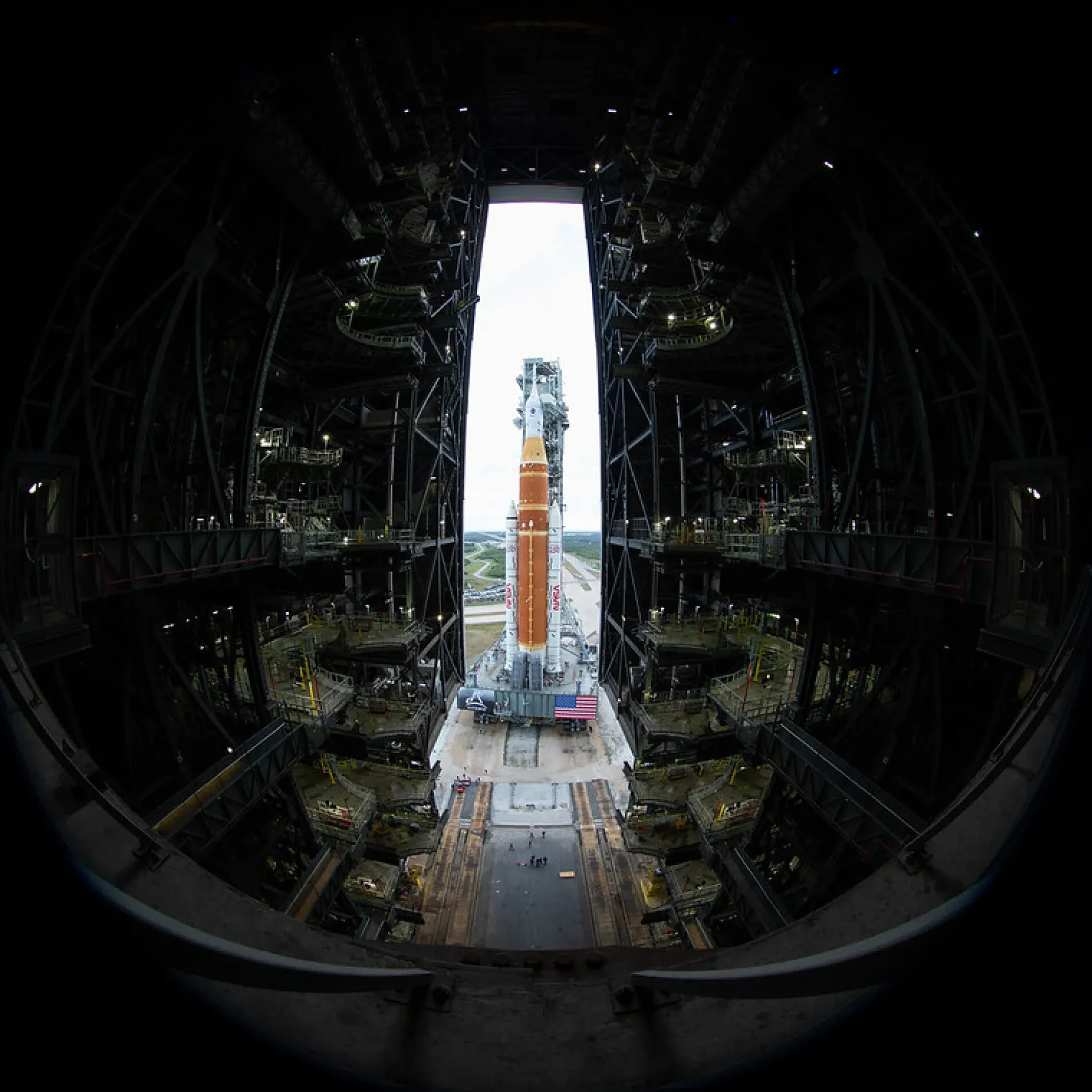 Artemis 2 SLS rocket emerging from the Vehicle Assembly Building on Jan. 17, 2026