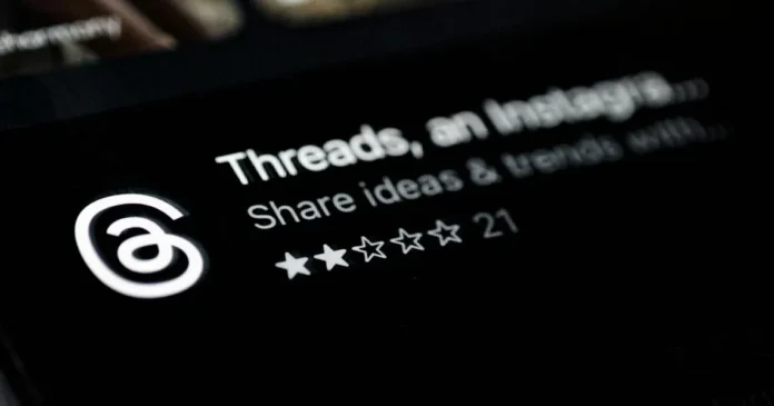 Ilustrasi aplikasi Threads di smartphone dengan latar belakang pengguna aktif bulanan mencapai 400 juta.